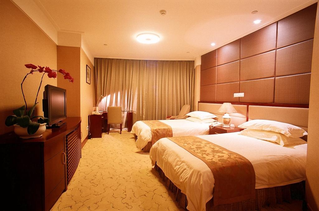 Shanghai Hengsheng Peninsula International Hotel Стая снимка